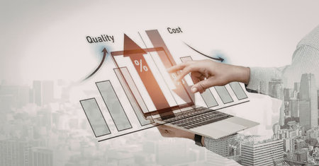 A businessman analyzing a graph on a laptop with quality and cost metrics, set against a cityscape...