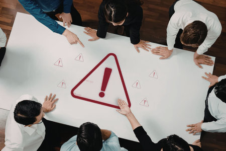 a group of people are gathered around a white table with a large red warning sign drawn on it in...