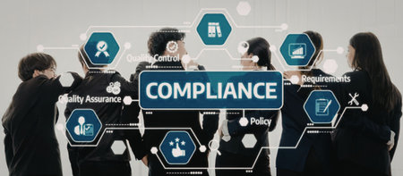 a diverse group of people standing in a line looking at a series of compliance related symbols and text on a grey backgroundの写真素材