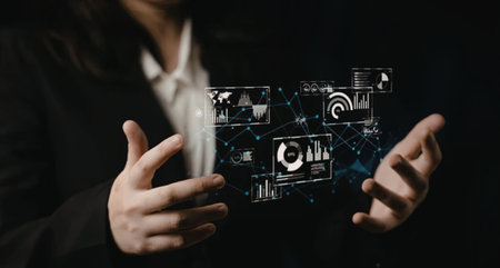 A woman in a business suit interacts with a futuristic virtual interface.