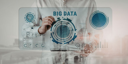 Business professional analyzes big data on a digital interface with futuristic technology and...