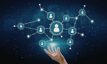 Hand projects glowing abstract social network interface featuring interconnected user icons...