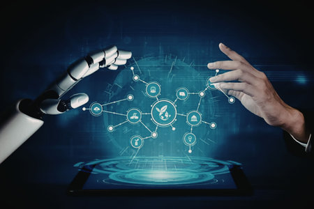 Human hand and robotic arm interact with a digital network displayed on a tablet screen, symbolizing...