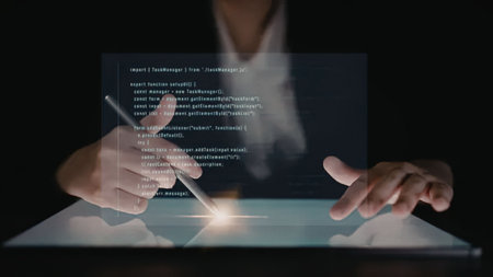 Professional hands are diligently working on a glowing transparent digital screen, inputting lines...