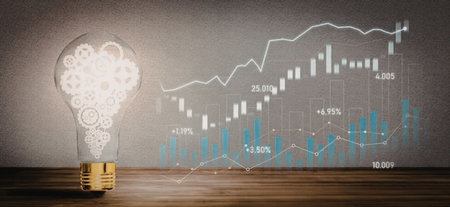A lightbulb with a graph and chart in the background, symbolizing innovative business growth and...