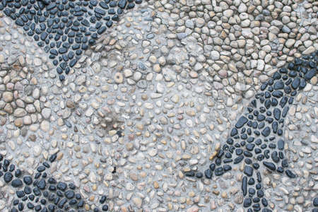 The surface of the many river stones. Great for design and texture background. Abstraction in...
