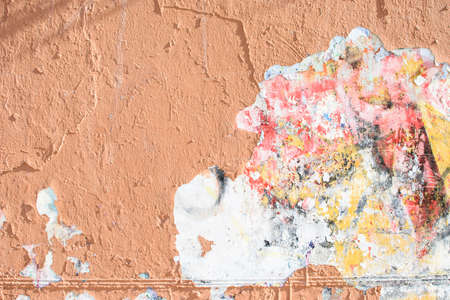 Old red wall of plaster, great for design and texture background.