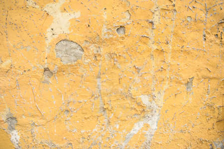 Yellow old wall of plaster, great for design and texture background.の写真素材