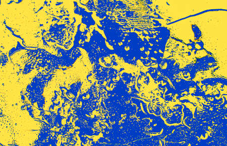 Digital liquid art. Yellow and blue texture for designer background. Colorful background. Abstract background of colorful fluid or liquid lines, creating a variety of beautiful curves on the surface.の写真素材