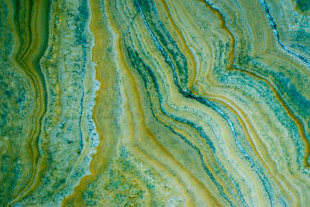 Marble nature texture made as if performed by fluid art technique. The drawing includes swirls of...