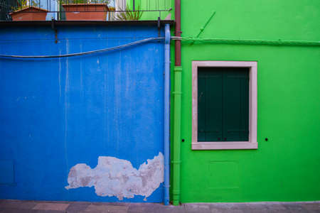 Colorful bright multi-colored fishing houses, Burano island, near Venice, Italy.の写真素材