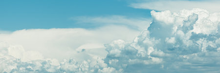 Beautiful blue sky with amazing white clouds. Nature background. Place for text. Banner.の写真素材