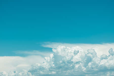 Beautiful blue sky with amazing white clouds. Nature background. Place for text.の写真素材