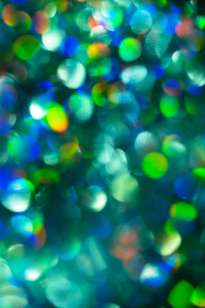 Abstract defocused christmas lights for decorative design. Vertical photo.の写真素材
