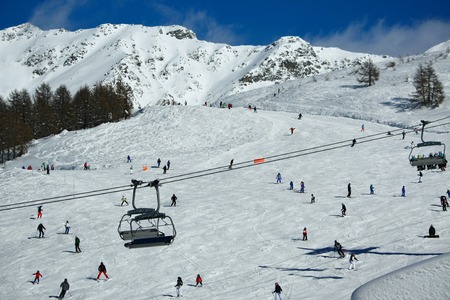 ski snow track with active people skiing Italyのeditorial素材