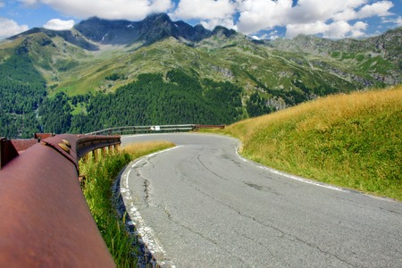 Beautiful rocky landscape with meandering mountain road . Wide angle shotの写真素材