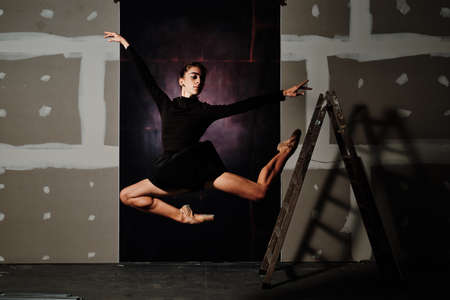 young female ballet dancer at the studioの写真素材