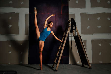 young female ballet dancer at the studioの写真素材