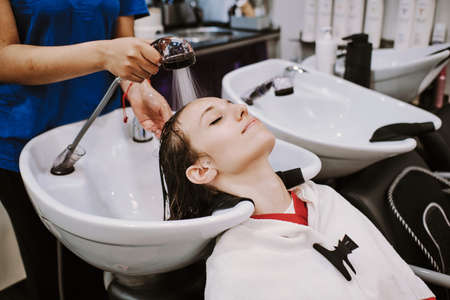 a young woman at the beauty salonの写真素材