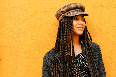 portrait of black woman with braids - real people concept