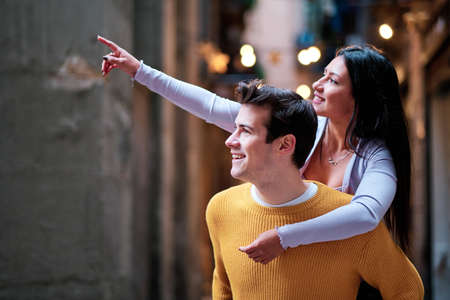 Young couple having fun on a date together outdoors.