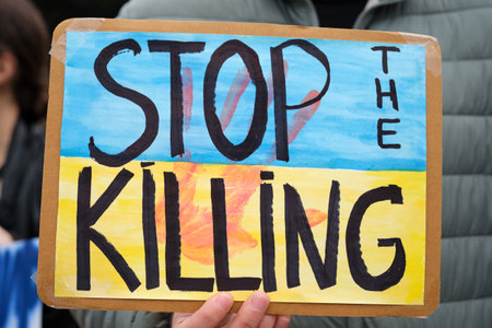 stop the killing sign with Ukranian flag colorsの写真素材