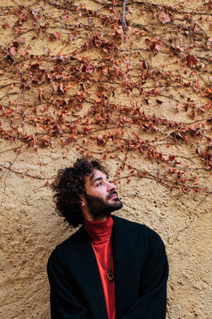 Portrait of a distracted stylish man outdoorsの写真素材