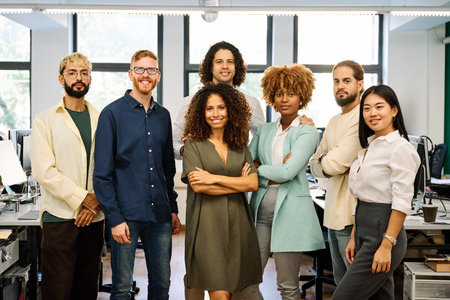 Portrait of the multicultural group of coworkers standing in the officeの写真素材