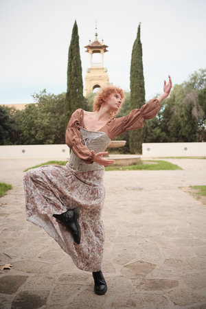 Person dancing in renaissance vintage style clothingの写真素材