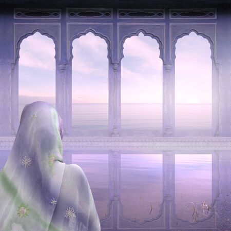 Indian woman in the mist near Ganges, India.の写真素材
