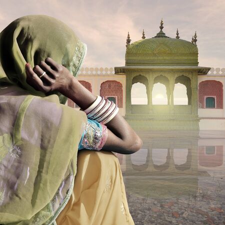 Woman with saree in a indian palace.
