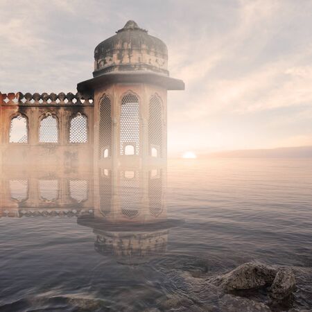 Indian monument on the Ganges river in the mist.の写真素材