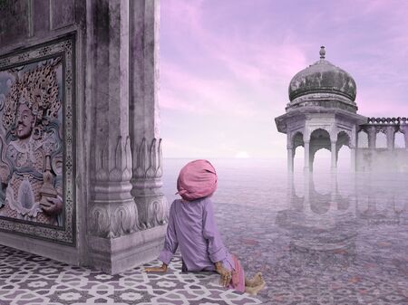 Indian man in a temple in the mist.の写真素材