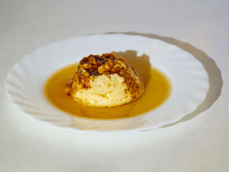 Beer Flan with sweet syrup on a plate