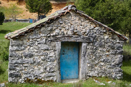 Ancient entry with Old Stone House in Cabrejas del Pinar, Soriaの写真素材