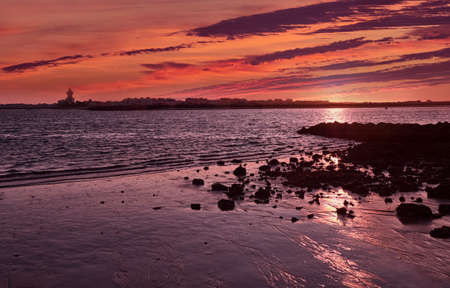 beach sunrise red huelva seaの写真素材