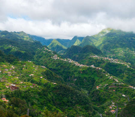 Mountain landscape. View of mountains and sea on the route Vereda da Penha de Aguia, Madeira Island, Portugal, Europe.の写真素材