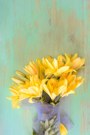 Close up of Lily flowers on the wooden background.の写真素材