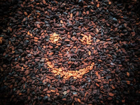 smile emoticon in cocoa beans can be used for walpaper and background