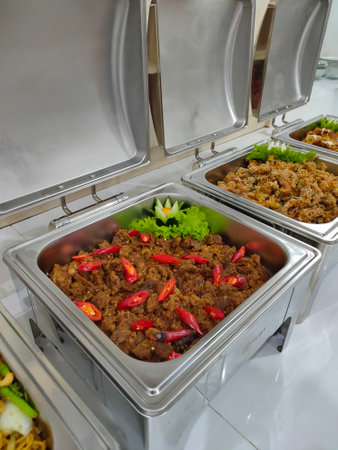 catering buffet food indoor in luxury restaurant with meat and vegetablesの写真素材