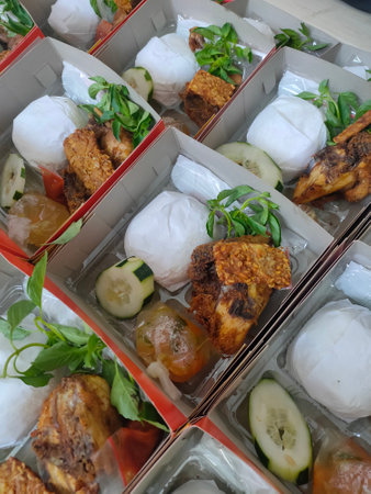 steamed fish balls with vegetables in boxの写真素材