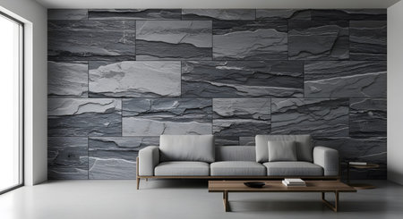 A contemporary living room with a dark slate tile accent wall, a minimalist sofa, and a light...