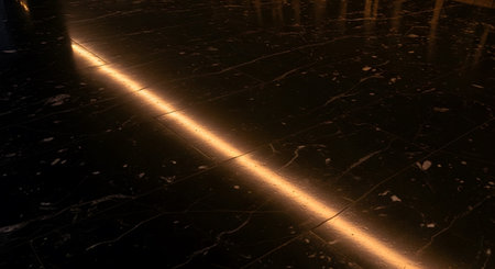 Single showing black marble floor with white veins and a single golden light line.