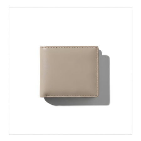 A simple beige leather bifold wallet with stitched edges is shown from a view against a white...
