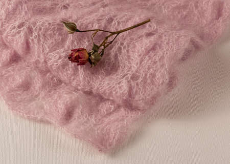 white scarf in a dark box. close-up