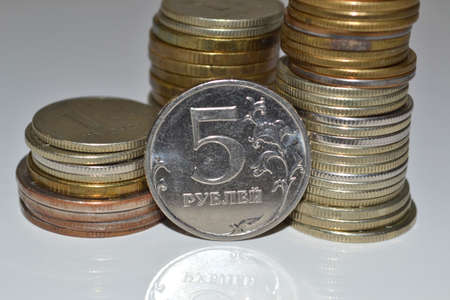 A little bit of money and bank notes and coins on the tableの写真素材