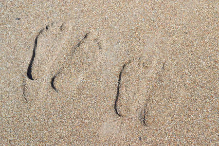 Fottprint sand on the beach ocean