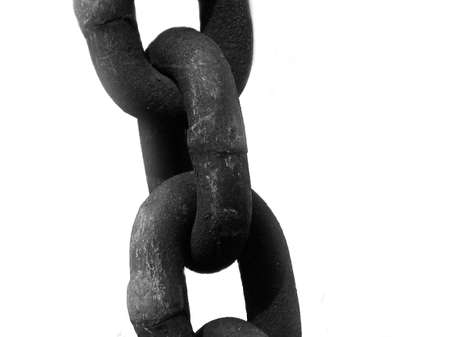 Dark rusty chain on a white backgroundの写真素材