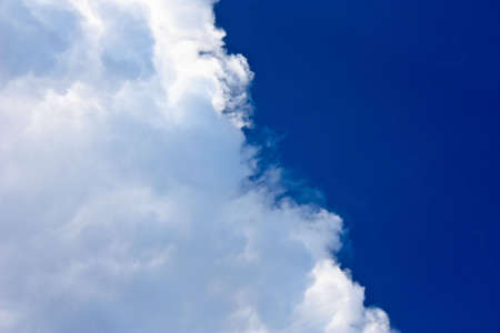 Moving clouds on a blue skyの写真素材