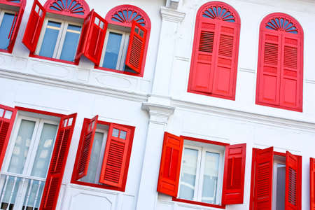 Vintage wooden windows in bright red colour